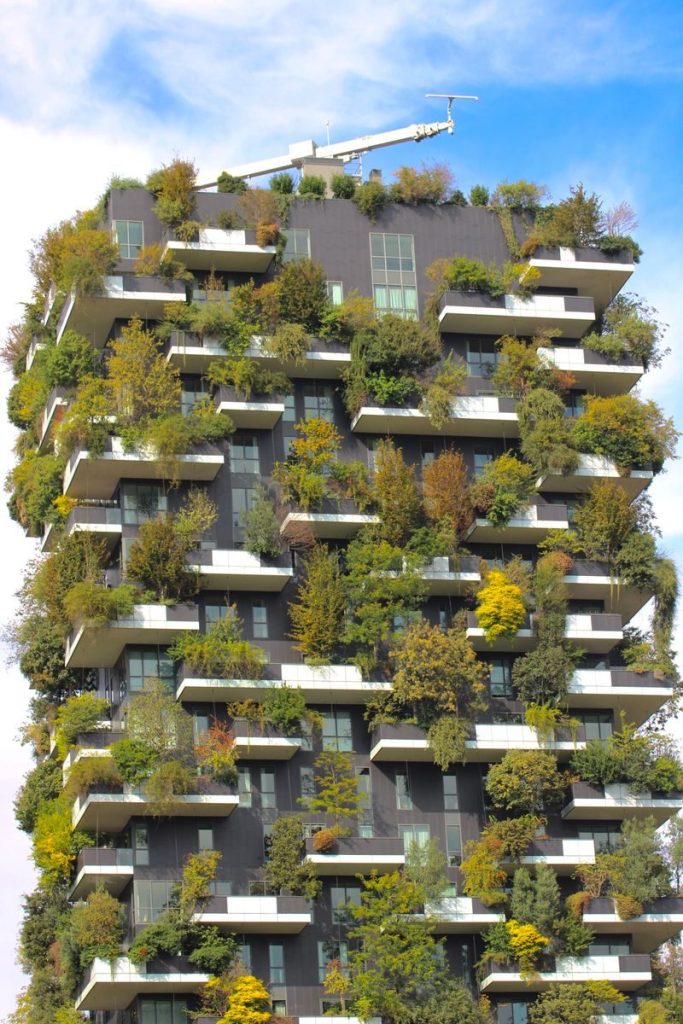 Bosco Verticale in Milan showcasing innovative eco-friendly design with lush greenery on a skyscraper.