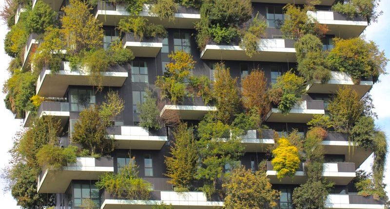 Bosco Verticale in Milan showcasing innovative eco-friendly design with lush greenery on a skyscraper.